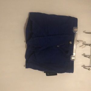 Shorts with attached braided belt